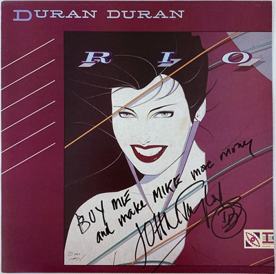 Lot 410 - DURAN DURAN - JOHN TAYLOR SIGNED SLEEVE.