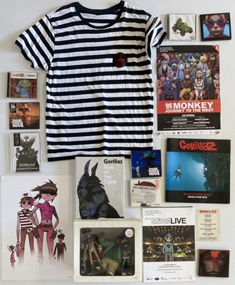 Lot 74 - GORILLAZ MEMORABILIA NIC KID ROBOT AND PRINTS.