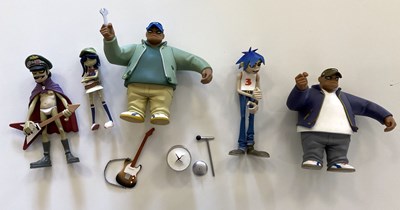 Lot 74 - GORILLAZ MEMORABILIA NIC KID ROBOT AND PRINTS.