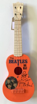 Lot 182 - SELCOL MINIATURE BIG BEAT GUITAR.