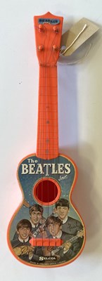 Lot 183 - SELCOL BEATLES MINIATURE GUITAR.