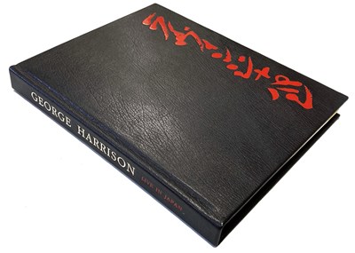 Lot 185 - GEORGE HARRISON & ERIC CLAPTON LIVE IN JAPAN GENESIS BOOK.