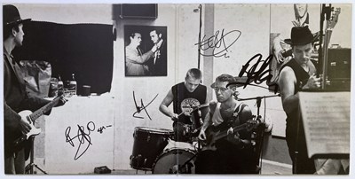 Lot 124 - U2 RATTLE AND HUM FULLY SIGNED LP.