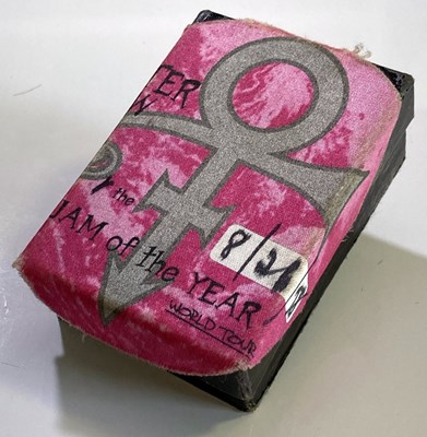 Lot 116 - PRINCE - CONCERT ISSUED EAR CUFF AND PLECTRUM.