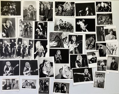 Lot 207 - 80S POP AND ROCK PRESS PHOTOS.
