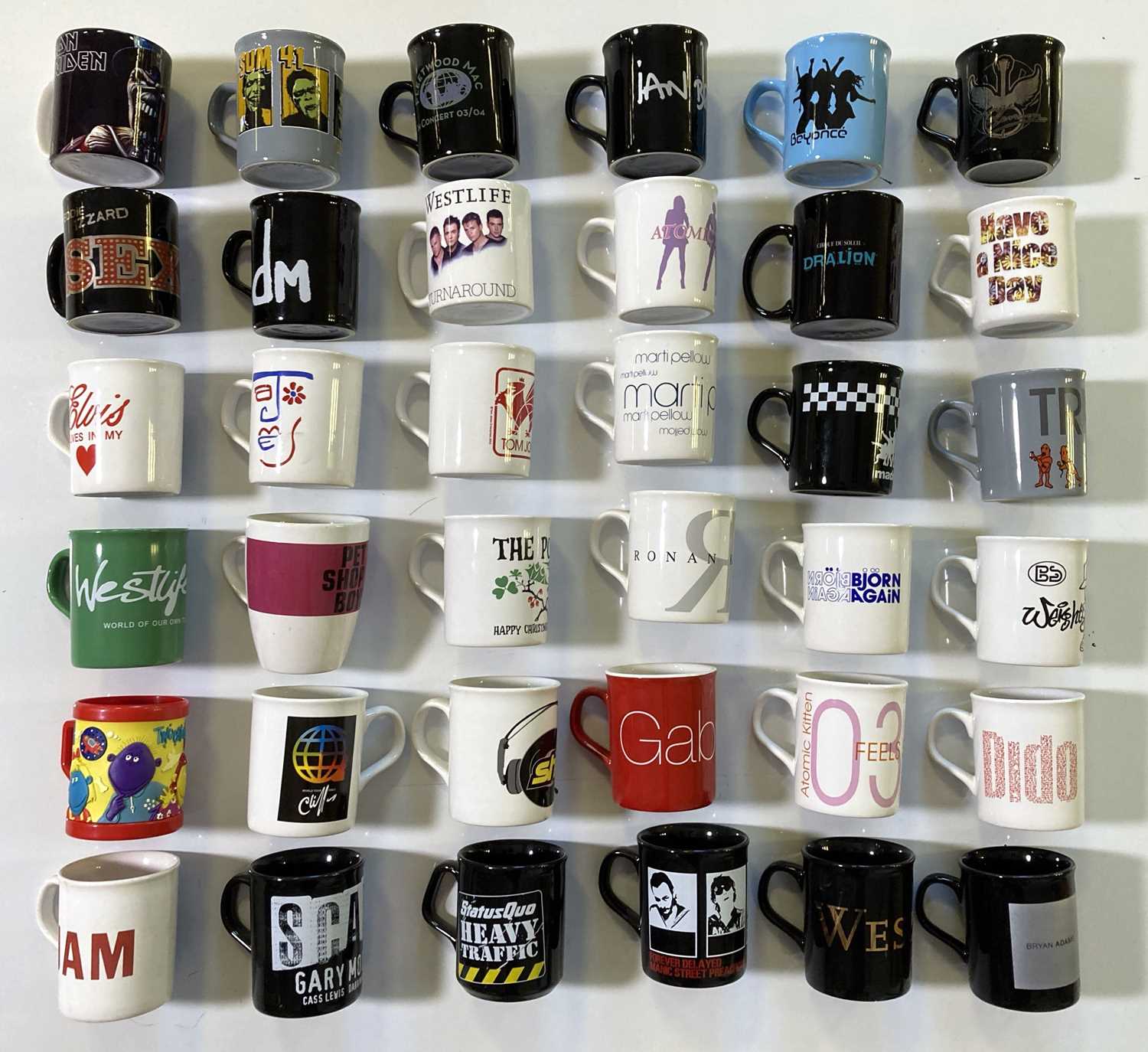 Lot 5 - MUSIC-RELATED MUGS.