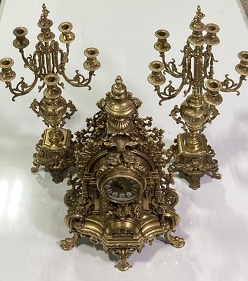 Lot 34 - FRENCH GILT CLOCK AND MATCHING CANDELABRAS