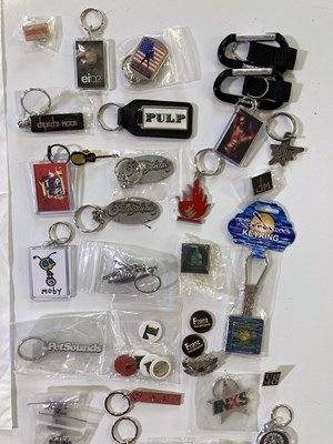 Lot 58 - ROCK/POP RELATED KEYRINGS & PIN BADGES.