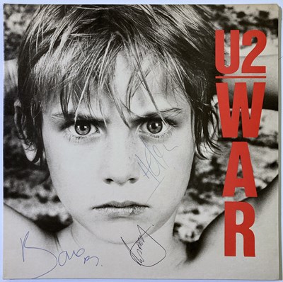 Lot 454 - U2 - WAR - A SIGNED LP.