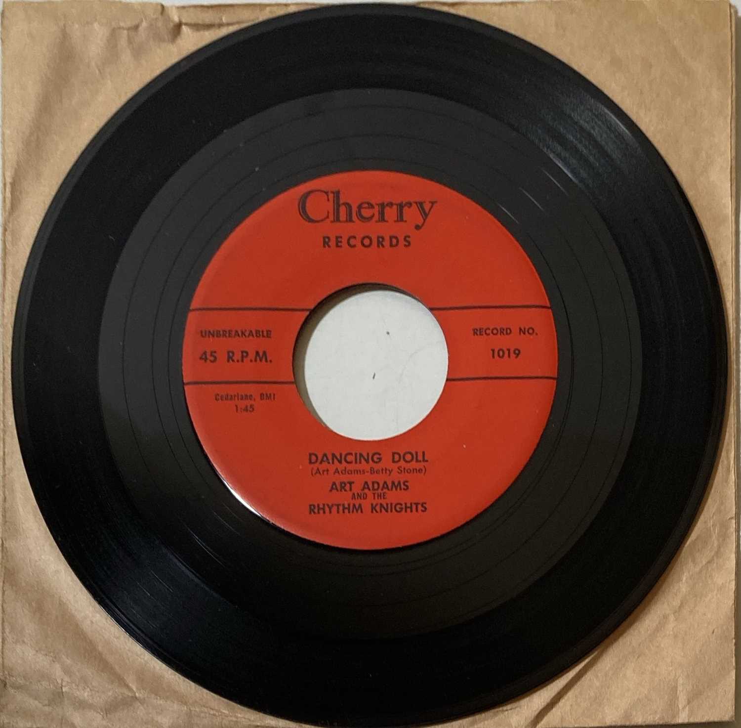 Lot 68 - ART ADAMS AND THE RHYTHM KNIGHTS - DANCING DOLL/SHE DON'T LIVE HERE NO MORE 7" (ORIGINAL US COPY - CHERRY RECORDS 1018)