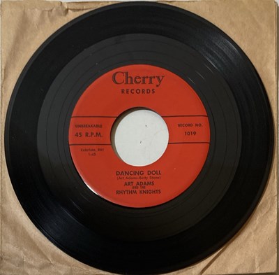 Lot 68 - ART ADAMS AND THE RHYTHM KNIGHTS - DANCING DOLL/SHE DON'T LIVE HERE NO MORE 7" (ORIGINAL US COPY - CHERRY RECORDS 1018)