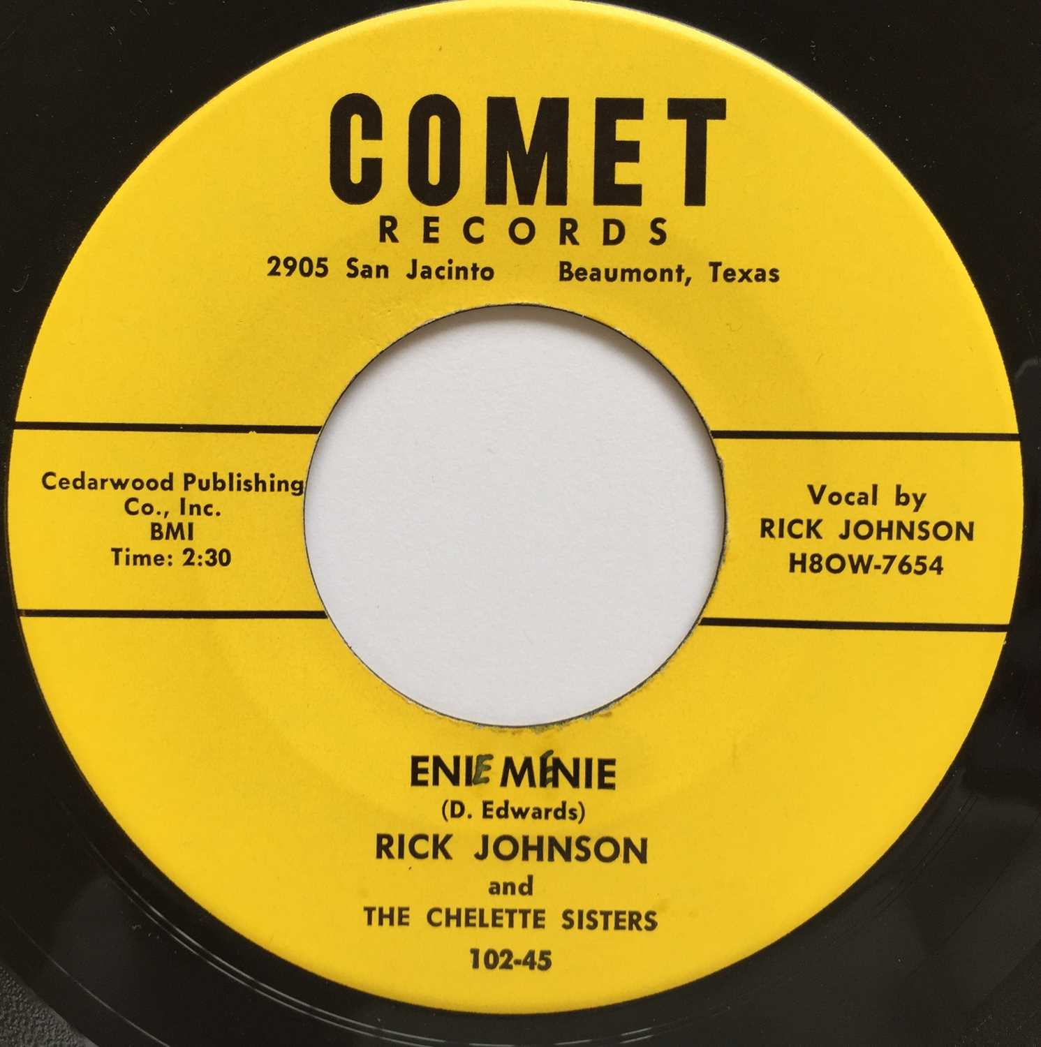 Lot 112 - RICK JOHNSON - ENI MINIE/ BOQUET OF ROSES 7" (ROCKABILLY - COMET 102-45)