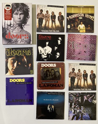 Lot 345 - THE DOORS - SIGNED DVD / SEALED CDS.