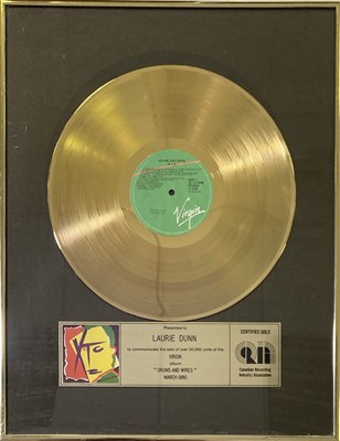 Lot 351 - XTC - A CANADIAN GOLD DISC AWARD FOR DRUMS AND WIRES.