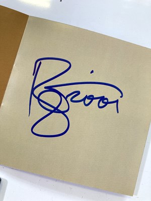 Lot 105 - IMAN - SIGNED BOOK INC CD BOOKLET SIGNED BY BOWIE.