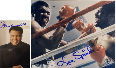 Lot 157 - SPORTS AUTOGRAPHS - MUHAMMAD ALI / LEON SPINKS SIGNED PHOTOGRAPHS