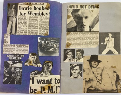 Lot 384 - DAVID BOWIE - PROGRAMMES, SCRAPBOOKS AND POSTER.