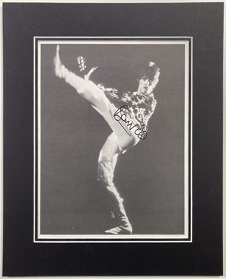 Lot 379 - DAVID BOWIE - A SIGNED 1970S IMAGE WITH COA.