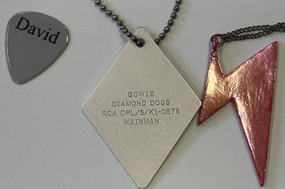 Lot 239 - DAVID BOWIE PENDANTS / DOGTAG / PLECTRUM