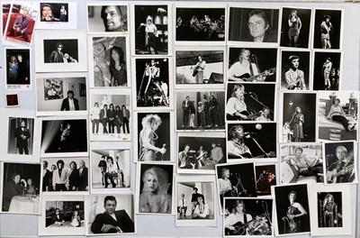 Lot 211 - PRESS AND PROMO 8X10" PHOTO COLLECTION.