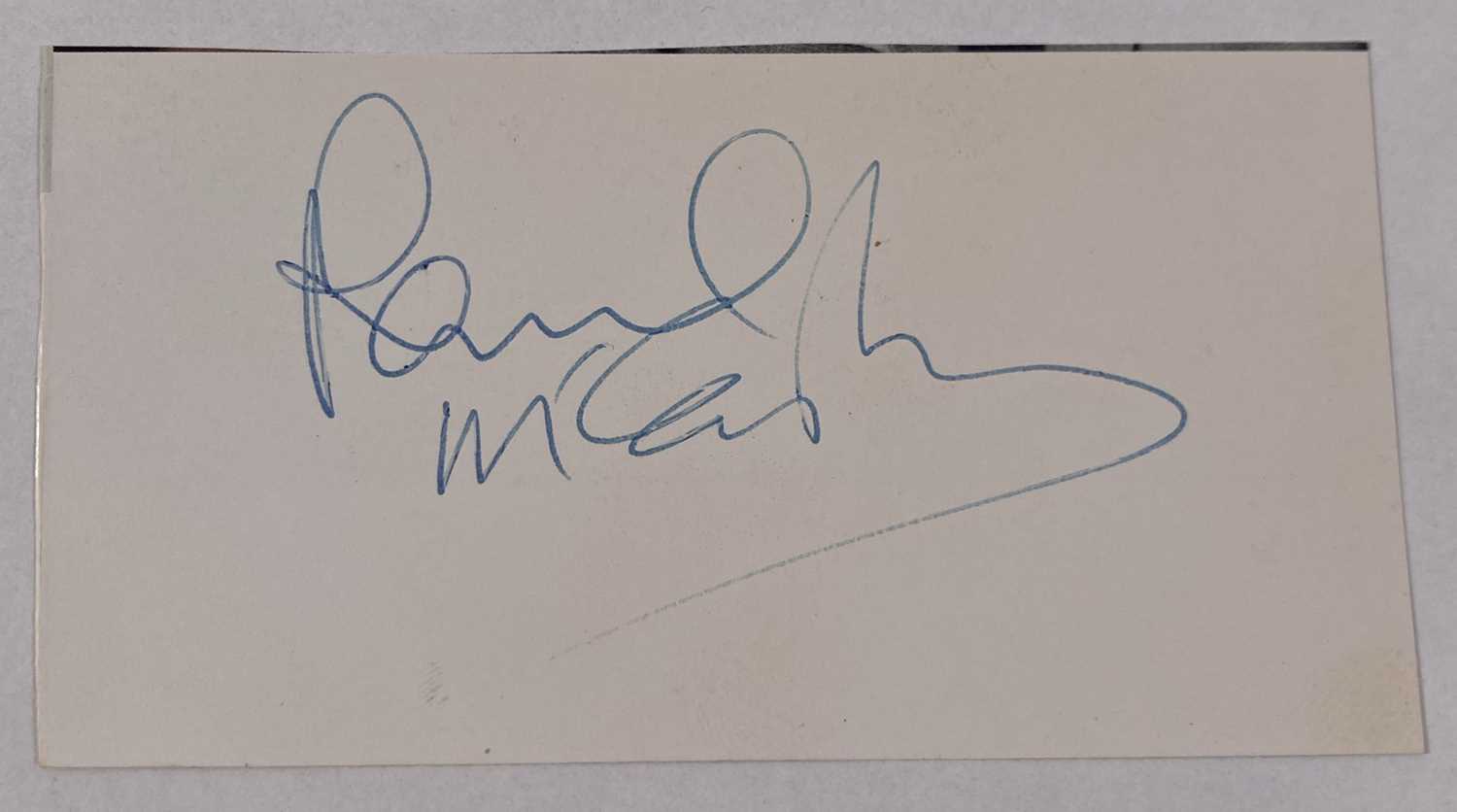 Lot 130 - PAUL MCCARTNEY - A SIGNED CUTTING.