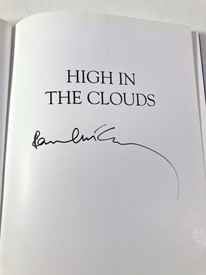 Lot 132 - THE BEATLES - HIGH IN THE CLOUDS BOOK SIGNED BY PAUL MCCARTNEY.