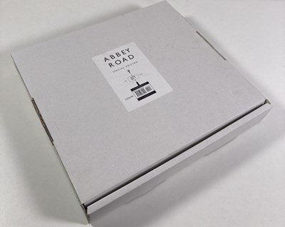 Lot 99 - THE BEATLES - STILL SEALED SPECIAL EDITION ABBEY ROAD BOOK SIGNED BY GEORGE MARTIN.