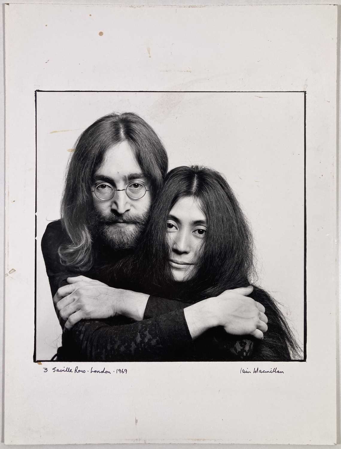 Lot 115 - THE BEATLES - JOHN LENNON / YOKO ONO - SIGNED PRINT BY IAIN MACMILLAN.