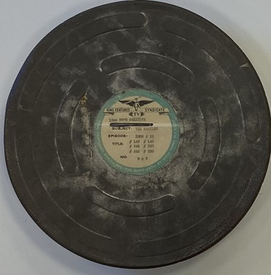 Lot 127 - KING FEATURES BEATLES SHOW FILM REEL & CAN PLUS FILM STRIPS & 8MM FILM.