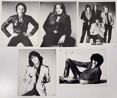 Lot 332 - THIN LIZZY - PROMOTIONAL PHOTOGRAPHS - TWO SIGNED BY PHIL LYNOTT.