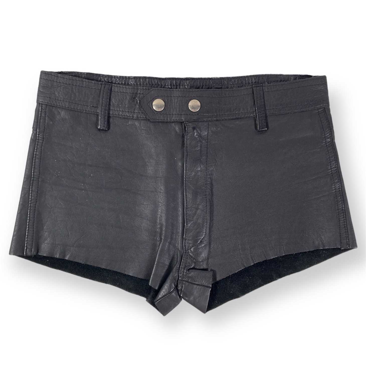 Lot 519 - QUEEN - FREDDIE MERCURY OWNED AND STAGEWORN LEATHER SHORTS.