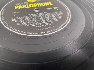 Lot 142 - THE BEATLES - A FULLY SIGNED COPY OF PLEASE PLEASE ME.