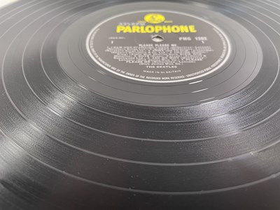 Lot 142 - THE BEATLES - A FULLY SIGNED COPY OF PLEASE PLEASE ME.