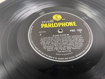 Lot 142 - THE BEATLES - A FULLY SIGNED COPY OF PLEASE PLEASE ME.