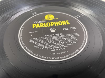 Lot 142 - THE BEATLES - A FULLY SIGNED COPY OF PLEASE PLEASE ME.