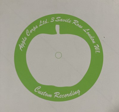Lot 94 - THE BEATLES INTEREST - APPLE RECORDS EPHEMERA INC UNUSED LABEL / APPLE LOG / LETTER ON STATIONERY.