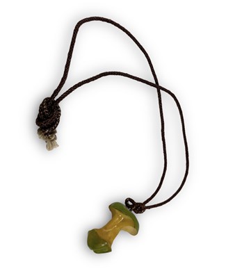 Lot 175 - THE BEATLES-  RARE APPLE EMPLOYEE ISSUE APPLE CORE PENDANT.