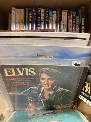 Lot 84 - ELVIS PRESLEY - BOOKS/DVDS/HEADLINES AND MAGAZINES.
