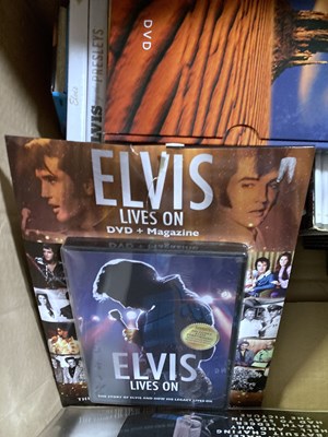 Lot 84 - ELVIS PRESLEY - BOOKS/DVDS/HEADLINES AND MAGAZINES.