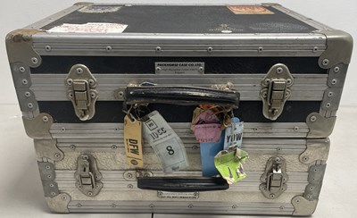 Lot 34 - STRAWBERRY STUDIOS - STRAWBERRY RENTALS COLLECTION - 10CC USED CASES ADORNED WITH STAGE PASSES.