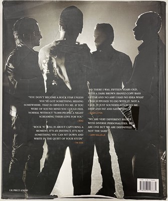 Lot 331 - U2 - FULLY SIGNED BOOK FROM BARNES AND NOBLE SIGNING SESSION.
