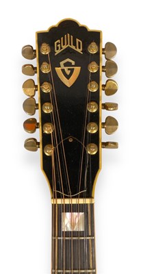 Lot 570 - YES INTEREST - A GUILD F-512 12 STRING ACOUSTIC GUITAR OWNED AND PLAYED BY CHRIS SQUIRE.