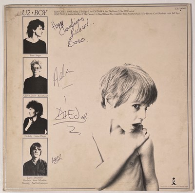 Lot 323 - U2 - SIGNED 'BOY' LP SLEEVE.