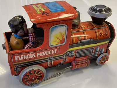 Lot 20 - DAYS WORK CHEWING TOBACCO ADVERT, KARAKIRI POSTER, RADIOACTIVE SIGN AND TINPLATE TRAIN