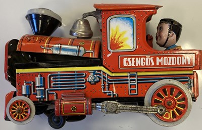 Lot 20 - DAYS WORK CHEWING TOBACCO ADVERT, KARAKIRI POSTER, RADIOACTIVE SIGN AND TINPLATE TRAIN