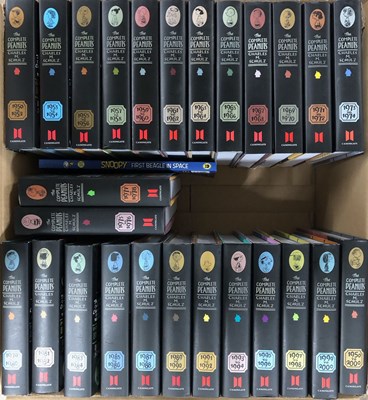 Lot 28 - SNOOPY - COMPLETE PEANUTS COMICS 1950-2000 BOOK SET