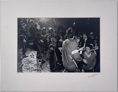 Lot 46 - THE CLASH - JOE STRUMMER / PAUL SIMONON SIGNED IAN DICKSON PHOTO.