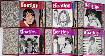 Lot 124 - THE BEATLES - FULL SET OF MONTHLY MAGAZINES IN BINDERS.