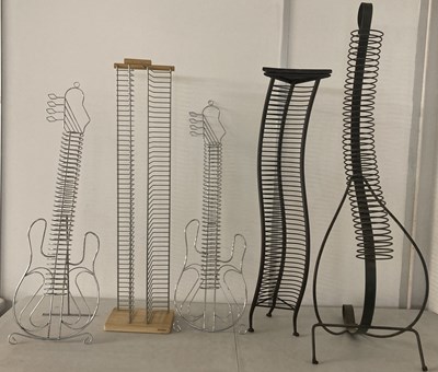 Lot 6 - CD RACKS. Five decorative CD racks. This lot...
