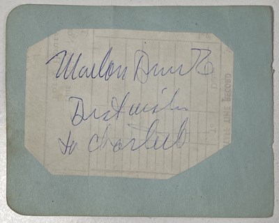 Lot 138A - MARLON BRANDO (1924-2004) A SIGNED AND INSCRIBED PAGE.